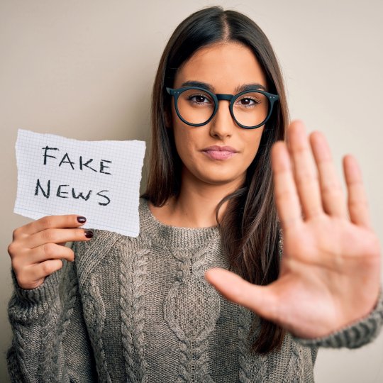 A communications team using an AI-powered media intelligence dashboard — illustrating how Factmata's technology powers CisionOne, Cision's flagship monitoring platform