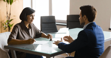 founder interviewing junior M&A advisor in her office