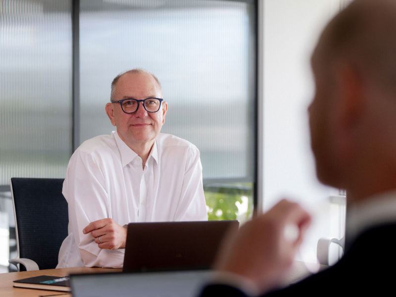 capeq-partner-mark-sapsford-discussing-project-with-client