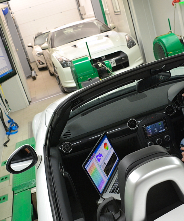 ecuTek-engineers-working-on-performance-ECU-tuning-hardware-the-UK-automotive-business-acquired-by-Promus-Equity-AMEI-Holdings