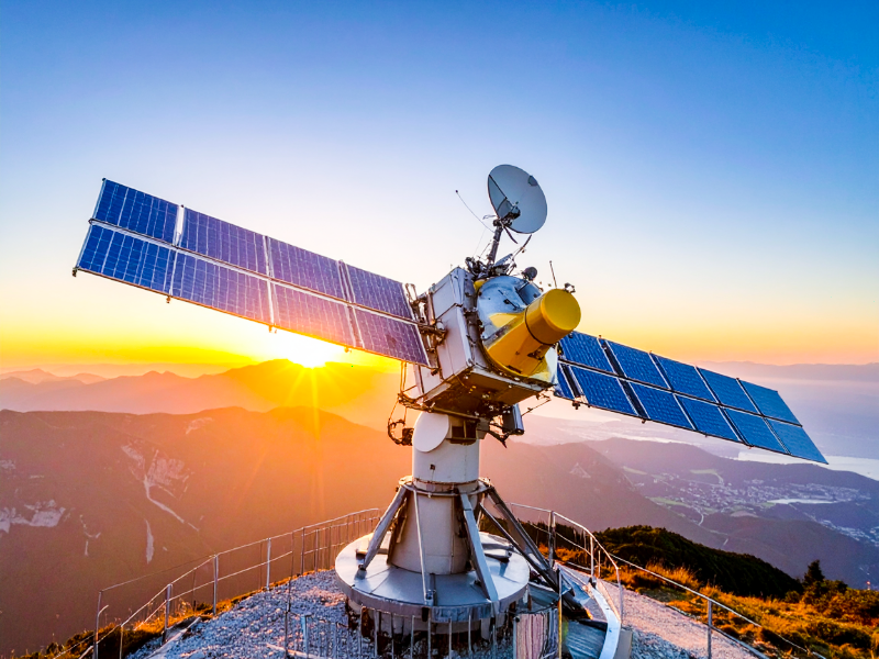 Satellite and cellular M2M connectivity infrastructure illustrating the Wireless Innovation managed services platform